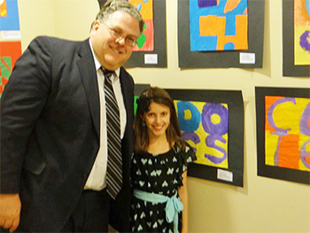 Rep. Briggs with a student artist.