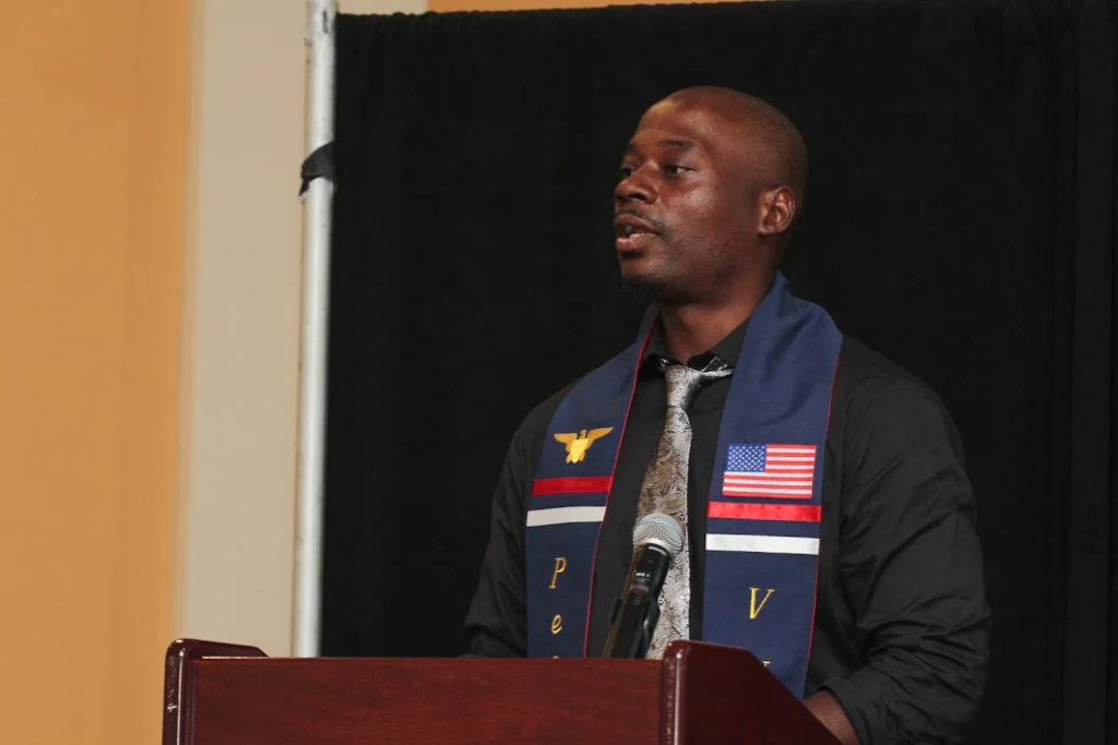 Veteran Michael Doe speaks at Penn VUB's 2018 graduation ceremony.